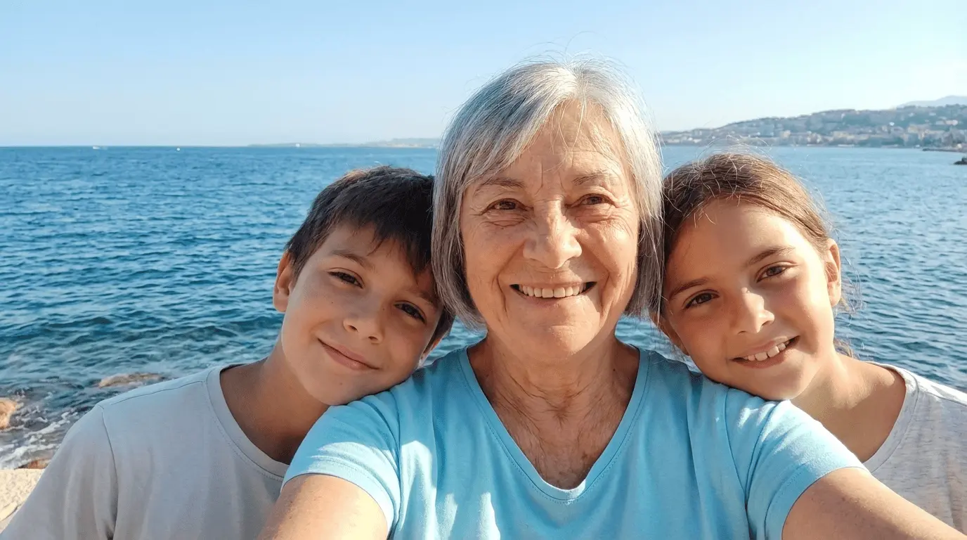 Eleanor with her grandchildren by the water
